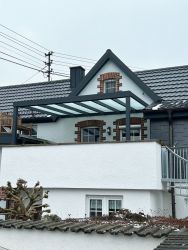Terrassendach als langlebiger Wetterschutz für die Terrasse