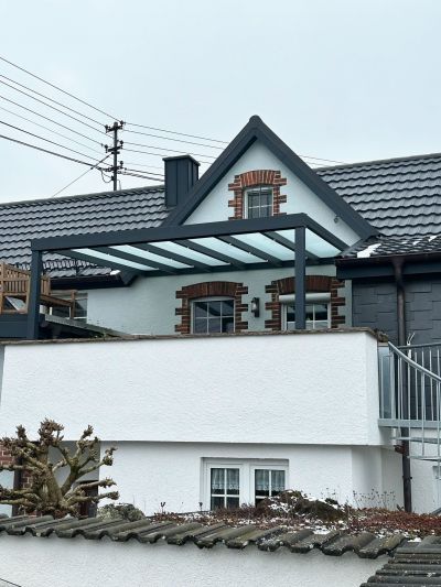 Terrassendach als langlebiger Wetterschutz für die Terrasse